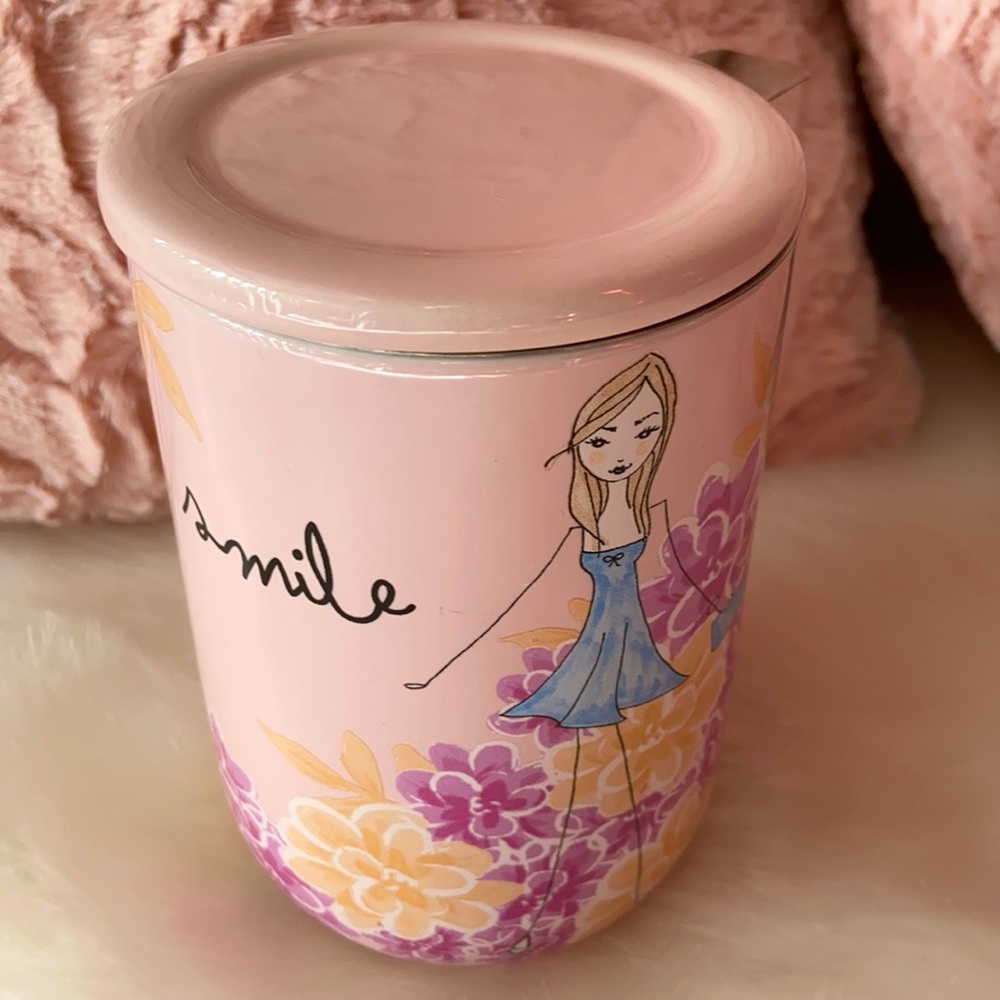Brand new pink travel mug with tea infuser.
